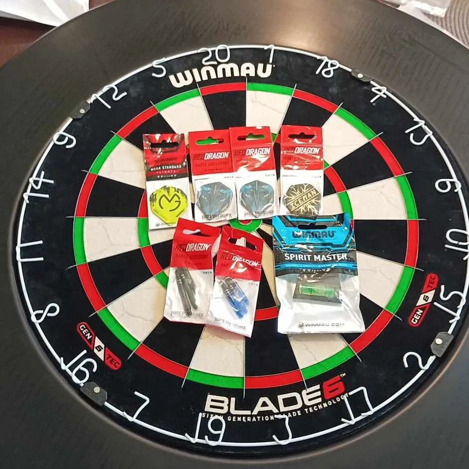 Urodzinowe zakupy 
Winmau blade 6 + ring ochronny
Piórka Gerwin Price the IceMan Gold

Piórka Peter Wright "the snakebite" blue transparent
Piórka MVG klasyczne zielone
Shafty red dragon short blue i medium black